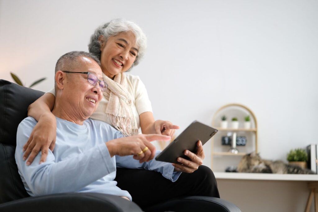 Older couple looking at tablet